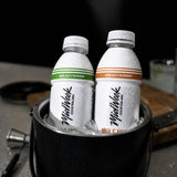 Two Midweek Mixers in a bucket of ice.